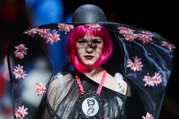 RUSSIA, MOSCOW - MARCH 13, 2025: A woman models one of the creations during a runway show for the Moscow Art and Industry Institute collection as part of the 4th Moscow Fashion Week at the Manege Central Exhibition Hall (Moscow Manege). Yevgeny Messman TASS  79070151