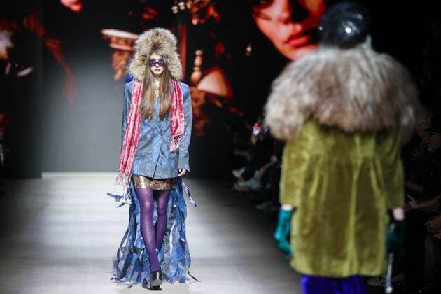 RUSSIA, MOSCOW - MARCH 13, 2025: A woman models one of the creations during a runway show for the Moscow Art and Industry Institute collection as part of the 4th Moscow Fashion Week at the Manege Central Exhibition Hall (Moscow Manege). Yevgeny Messman TASS  79070389