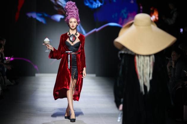 RUSSIA, MOSCOW - MARCH 13, 2025: A woman models one of the creations during a runway show for the Moscow Art and Industry Institute collection as part of the 4th Moscow Fashion Week at the Manege Central Exhibition Hall (Moscow Manege). Yevgeny Messman TASS  79070397