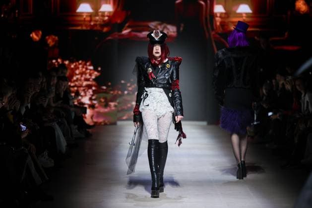 RUSSIA, MOSCOW - MARCH 13, 2025: A woman models one of the creations during a runway show for the Moscow Art and Industry Institute collection as part of the 4th Moscow Fashion Week at the Manege Central Exhibition Hall (Moscow Manege). Yevgeny Messman TASS  79070392