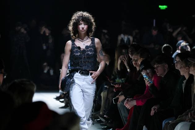 RUSSIA, MOSCOW - MARCH 13, 2025: A model showcase creations during a runway show for the Lurvin brand collection as part of the 4th Moscow Fashion Week at the Manege Central Exhibition Hall. Arina Antonova TASS  79074603