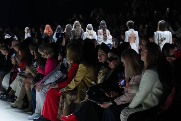 RUSSIA, MOSCOW - MARCH 13, 2025: People attend a runway show for the Lurvin brand collection as part of the 4th Moscow Fashion Week at the Manege Central Exhibition Hall. Arina Antonova TASS  79074604