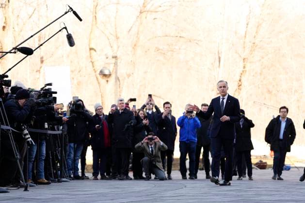 March 14, 2025, Ottawa, On, Canada: Prime minister-designate Mark Carney heads into Rideau Hall for a swearing in ceremony after talking to media in Ottawa on Friday, March 14, 2025. Ottawa Canada  - ZUMAc35_ 20250314_zaf_c35_058 Copyright: xJustinxTangx