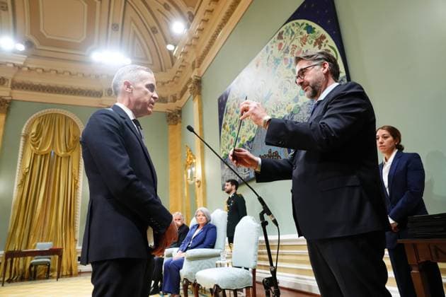 March 14, 2025, Ottawa, On, Canada: Mark Carney is sworn in as prime minister during a ceremony at Rideau Hall in Ottawa on Friday, March 14, 2025. Ottawa Canada  - ZUMAc35_ 20250314_zaf_c35_074 Copyright: xSeanxKilpatrickx