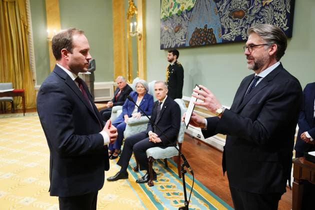 March 14, 2025, Ottawa, On, Canada: Nate Erskine-Smith is sworn in as the Minister of Housing, Infrastructure and Communities during a swearing in ceremony at Rideau Hall in Ottawa on Friday, March 14, 2025. Ottawa Canada  - ZUMAc35_ 20250314_zaf_c35_094 Copyright: xSeanxKilpatrickx