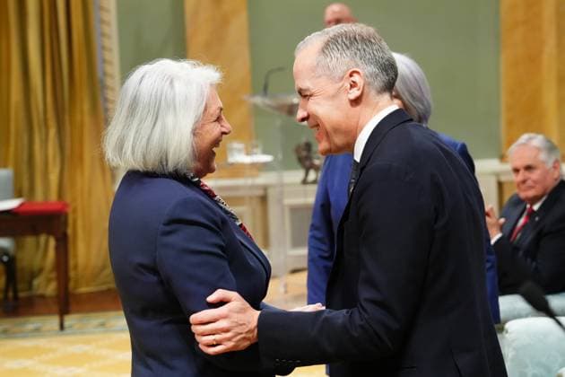 March 14, 2025, Ottawa, On, Canada: Joanne Thompson is congratulated by Prime Minister Mark Carney after being sworn in as the Minister of Fisheries, Oceans and the Canadian Coast Guard during a swearing in ceremony at Rideau Hall in Ottawa on Friday, March 14, 2025. Ottawa Canada  - ZUMAc35_ 20250314_zaf_c35_098 Copyright: xSeanxKilpatrickx