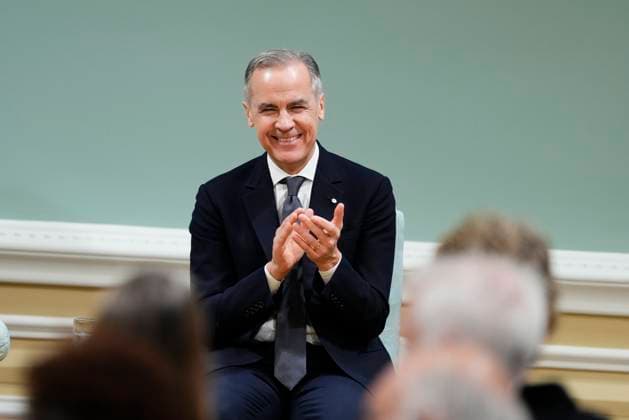 March 14, 2025, Ottawa, On, Canada: Prime Minister Mark Carney applauds during a swearing in ceremony at Rideau Hall in Ottawa on Friday, March 14, 2025. Ottawa Canada  - ZUMAc35_ 20250314_zaf_c35_122 Copyright: xJustinxTangx
