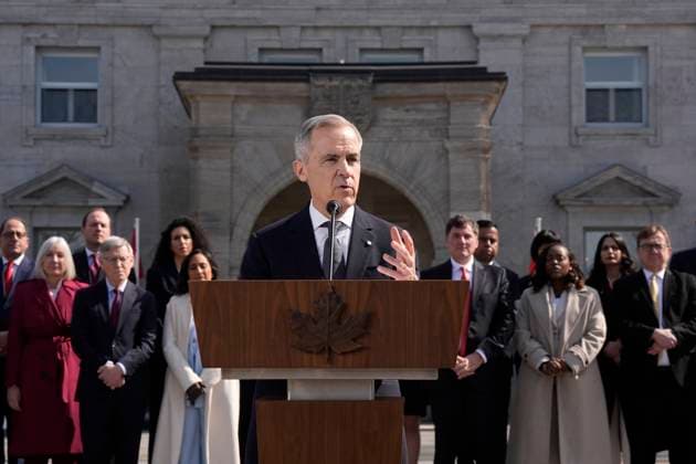 March 14, 2025, Ottawa, On, Canada: Prime Minister Mark Carney holds a press conference as members of his cabinet look on following a swearing in ceremony at Rideau Hall in Ottawa on Friday, March 14, 2025. Ottawa Canada  - ZUMAc35_ 20250314_zaf_c35_166 Copyright: xAdrianxWyldx