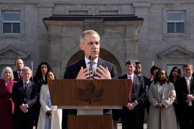 March 14, 2025, Ottawa, On, Canada: Prime Minister Mark Carney holds a press conference as members of his cabinet look on following a swearing in ceremony at Rideau Hall in Ottawa on Friday, March 14, 2025. Ottawa Canada  - ZUMAc35_ 20250314_zaf_c35_174 Copyright: xAdrianxWyldx