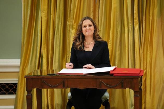 March 14, 2025, Ottawa, On, Canada: Minister of Transport and Internal Trade Chrystia Freeland signs after being sworn in during a ceremony at Rideau Hall in Ottawa on Friday, March 14, 2025. Ottawa Canada  - ZUMAc35_ 20250314_zaf_c35_187 Copyright: xSeanxKilpatrickx