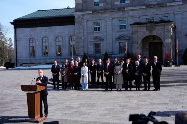 March 14, 2025, Ottawa, On, Canada: Prime Minister Mark Carney holds a press conference as members of his cabinet look on following a swearing in ceremony at Rideau Hall in Ottawa on Friday, March 14, 2025. Ottawa Canada  - ZUMAc35_ 20250314_zaf_c35_195 Copyright: xJustinxTangx
