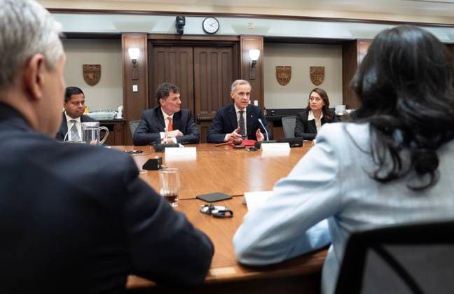 March 14, 2025, Ottawa, On, Canada: Prime Minister Mark Carney speaks with members of cabinet on Parliement Hill, Friday, March 14, 2025 in Ottawa. Ottawa Canada  - ZUMAc35_ 20250314_zaf_c35_220 Copyright: xAdrianxWyldx