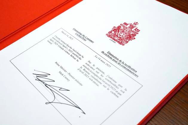 March 14, 2025, Ottawa, On, CAN: An order-in-council to eliminate the consumer carbon price, signed by Prime Minister Mark Carney, is shown on Parliament Hill in Ottawa on Friday, March 14, 2025. Ottawa CAN  - ZUMAc35_ 20250314_zaf_c35_228 Copyright: xJustinxTangx