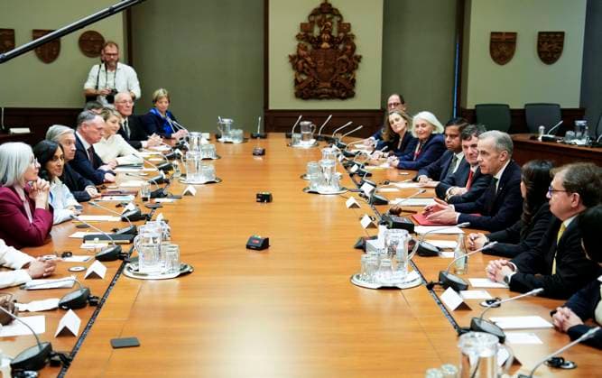 March 14, 2025, Ottawa, On, CAN: Prime Minister Mark Carney is joined by his cabinet as he speaks before signing an order-in-council to eliminate the consumer carbon price, on Parliament Hill in Ottawa, on Friday, March 14, 2025. Ottawa CAN  - ZUMAc35_ 20250314_zaf_c35_263 Copyright: xJustinxTangx