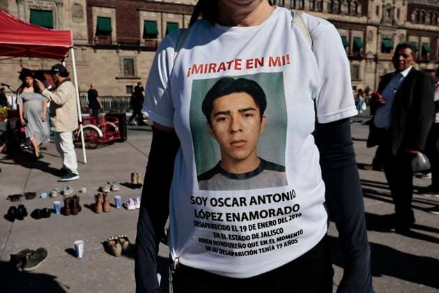March 15, 2025, Mexico City, Cdmx, Mexico: In recent days, a training and extermination camp was discovered in Teuchitlan, Jalisco. The Rancho Izaguirre, which was discovered and secured by federal forces, belongs to the Jalisco New Generation Cartel (CJNG). For this reason, groups searching for missing persons called for a nationwide vigil in memory of the victims and missing persons from all over Mexico. Constitution Plaza in Mexico City was the designated location for the placement of 400 shoes and candles to express their outrage at the government s lack of response and solution. Mexico City Mexico - ZUMAp204 20250315_zip_p204_018 Copyright: xJosuexPerezx
