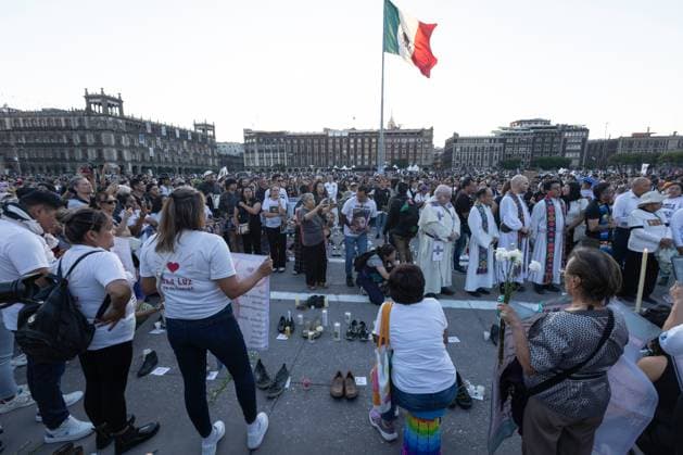 March 16, 2025, Mexico City, Mexico: Relatives of missing persons, organizations and individuals called for a day of national mourning for the discovery of an extermination camp in TeuchitloÂ¡n, Jalisco. In Mexico City, protesters placed shoes and candles in the main square, in front of the National Palace. Mexico City Mexico - ZUMAl178 20250316_znp_l178_012 Copyright: xCristianxLeyvax