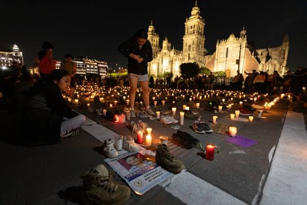 March 16, 2025, Mexico City, Mexico: Relatives of missing persons, organizations and individuals called for a day of national mourning for the discovery of an extermination camp in TeuchitloÂ¡n, Jalisco. In Mexico City, protesters placed shoes and candles in the main square, in front of the National Palace. Mexico City Mexico - ZUMAl178 20250316_znp_l178_031 Copyright: xCristianxLeyvax