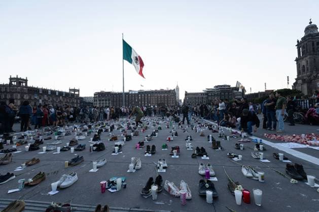 March 16, 2025, Mexico City, Mexico: Relatives of missing persons, organizations and individuals called for a day of national mourning for the discovery of an extermination camp in TeuchitloÂ¡n, Jalisco. In Mexico City, protesters placed shoes and candles in the main square, in front of the National Palace. Mexico City Mexico - ZUMAl178 20250316_znp_l178_033 Copyright: xCristianxLeyvax