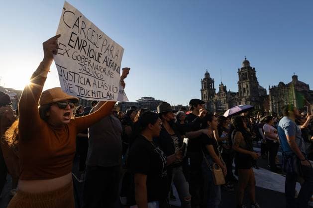 March 16, 2025, Mexico City, Mexico: Relatives of missing persons, organizations and individuals called for a day of national mourning for the discovery of an extermination camp in TeuchitloÂ¡n, Jalisco. In Mexico City, protesters placed shoes and candles in the main square, in front of the National Palace. Mexico City Mexico - ZUMAl178 20250316_znp_l178_035 Copyright: xCristianxLeyvax