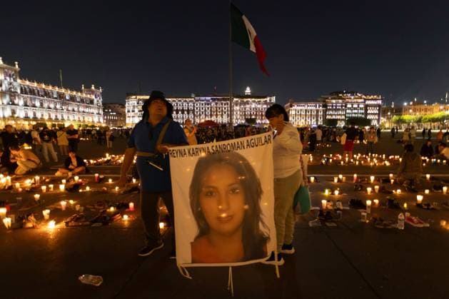 March 16, 2025, Mexico City, Mexico: Relatives of missing persons, organizations and individuals called for a day of national mourning for the discovery of an extermination camp in TeuchitloÂ¡n, Jalisco. In Mexico City, protesters placed shoes and candles in the main square, in front of the National Palace. Mexico City Mexico - ZUMAl178 20250316_znp_l178_042 Copyright: xCristianxLeyvax