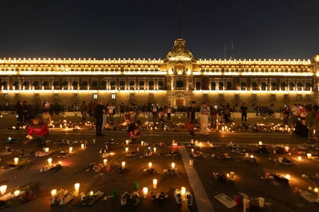 March 16, 2025, Mexico City, Mexico: Relatives of missing persons, organizations and individuals called for a day of national mourning for the discovery of an extermination camp in TeuchitloÂ¡n, Jalisco. In Mexico City, protesters placed shoes and candles in the main square, in front of the National Palace. Mexico City Mexico - ZUMAl178 20250316_znp_l178_046 Copyright: xCristianxLeyvax