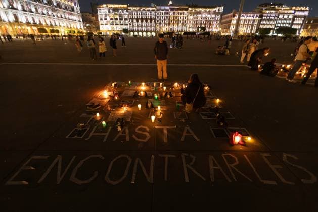 March 16, 2025, Mexico City, Mexico: Relatives of missing persons, organizations and individuals called for a day of national mourning for the discovery of an extermination camp in TeuchitloÂ¡n, Jalisco. In Mexico City, protesters placed shoes and candles in the main square, in front of the National Palace. Mexico City Mexico - ZUMAl178 20250316_znp_l178_051 Copyright: xCristianxLeyvax