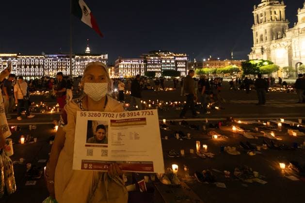 March 16, 2025, Mexico City, Mexico: Relatives of missing persons, organizations and individuals called for a day of national mourning for the discovery of an extermination camp in TeuchitloÂ¡n, Jalisco. In Mexico City, protesters placed shoes and candles in the main square, in front of the National Palace. Mexico City Mexico - ZUMAl178 20250316_znp_l178_057 Copyright: xCristianxLeyvax