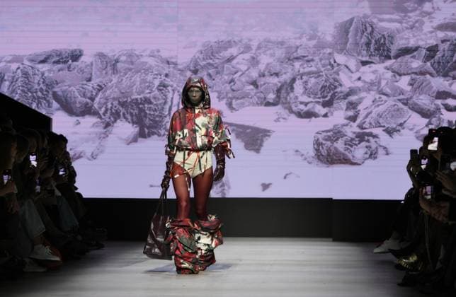 Russia Moscow Fashion Week 8880479 16.03.2025 A model presents a creation by the brand GAPANOVICH during the 4th Moscow Fashion Week at the Manege Central Exhibition Hall in Moscow, Russia. Grigory Sysoev Sputnik Moscow Russia  Copyright: xGrigoryxSysoevx