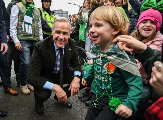 March 16, 2025, Montreal, Pq, Canada: Prime Minister Mark Carney meets young members of the crowd during the annual St. Patrick s Day Parade in Montreal, Sunday, March 16, 2025. Montreal Canada  - ZUMAc35_ 20250316_zaf_c35_004 Copyright: xGrahamxHughesx
