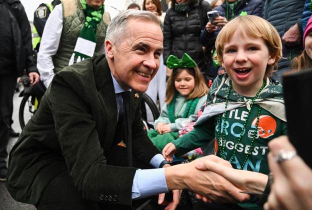 March 16, 2025, Montreal, Pq, Canada: Prime Minister Mark Carney meets young members of the crowd during the annual St. Patrick s Day Parade in Montreal, Sunday, March 16, 2025. Montreal Canada  - ZUMAc35_ 20250316_zaf_c35_005 Copyright: xGrahamxHughesx
