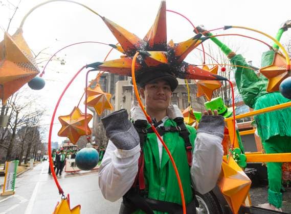 (250317) -- TORONTO, March 17, 2025 -- A dressed-up performer poses for photos during the 2025 Toronto St. Patrick s Day Parade in Toronto, Canada, on March 16, 2025. St. Patrick s Day is widely celebrated by Irish communities around the world. (Photo by Xinhua) CANADA-TORONTO-ST. PATRICK S DAY-PARADE ZouxZheng 