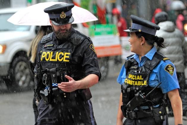 St. Patrick s Day Parade In Downtown Toronto, Canada, On March 16, 2025. A pair of Ontario Provincial Police constables walk in the rain along Yonge Street during the St. Patrick s Day parade in Toronto, Canada, on March 16, 2025. Toronto Canada  Copyright: xMikexCampbellx originalFilename: campbell-notitle250317_npEoW.jpg