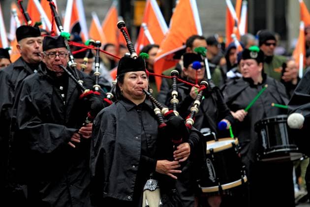 St. Patrick s Day Parade In Downtown Toronto, Canada, On March 16, 2025. A band member plays the bagpipes during the St. Patrick s Day parade in Toronto, Canada, on March 16, 2025. Toronto Canada  Copyright: xMikexCampbellx originalFilename: campbell-notitle250317_npQdH.jpg