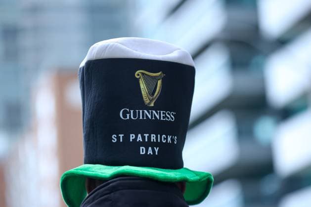 2025 Toronto St. Patrick s Day Parade A tall hat with the Guinness brand appears during the 2025 Toronto St. Patrick s Day Parade in Toronto, Ontario, Canada, on March 16, 2025. Toronto Ontario Canada  Copyright: xIndrawanxKumalax originalFilename: kumala-2025toro250316_npmZH.jpg
