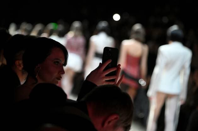 Russia Moscow Fashion Week 8881345 17.03.2025 A visitor films the presentation of creations by the brand LI LAB during the 4th Moscow Fashion Week at the Manege Central Exhibition Hall in Moscow, Russia. Vladimir Astapkovich Sputnik Moscow Russia  Copyright: xVladimirxAstapkovichx