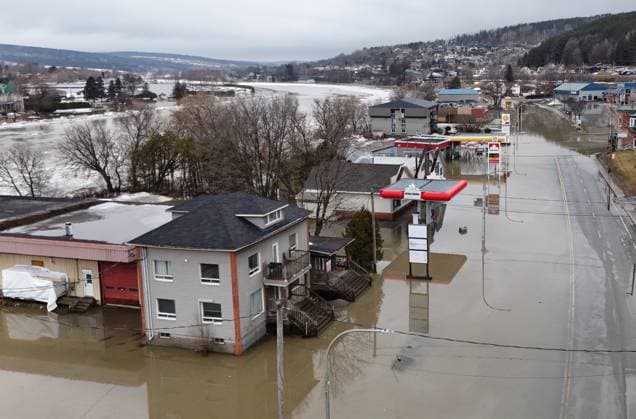 March 18, 2025, Beauceville, Pq, Canada: A convenience store and a gas station are flooded on highway 173 in Beauceville, Que., Monday, March 17, 2025. The Chaudiere river flooded the city after an ice blockage overnight. Beauceville Canada  - ZUMAc35_ 20250318_zaf_c35_002 Copyright: xJacquesxBoissinotx