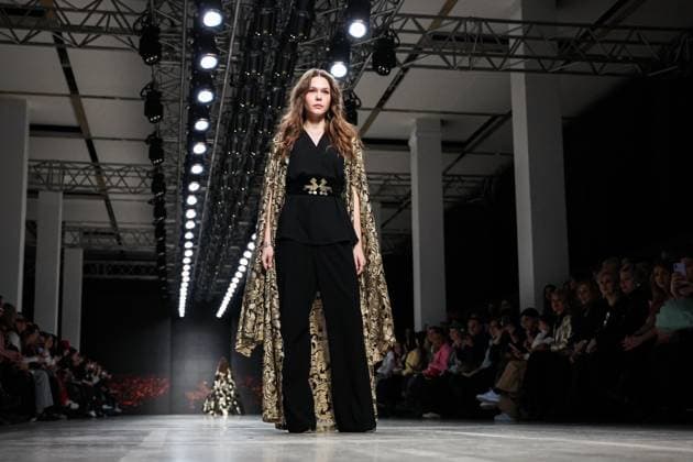 RUSSIA, MOSCOW - MARCH 18, 2025: A model showcases creations during a runway show for the collection by Bouzma ethnique as part of the 4th Moscow Fashion Week at the Manege Central Exhibition Hall. Valery Sharifulin TASS  79200987