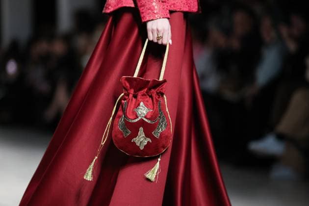 RUSSIA, MOSCOW - MARCH 18, 2025: A model showcases creations during a runway show for the collection by Bouzma ethnique as part of the 4th Moscow Fashion Week at the Manege Central Exhibition Hall. Valery Sharifulin TASS  79200994