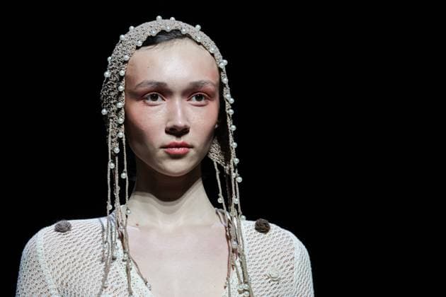 RUSSIA, MOSCOW - MARCH 18, 2025: A model showcases creations during a runway show for the collection by Masterpeace as part of the 4th Moscow Fashion Week at the Manege Central Exhibition Hall. Valery Sharifulin TASS  79203002