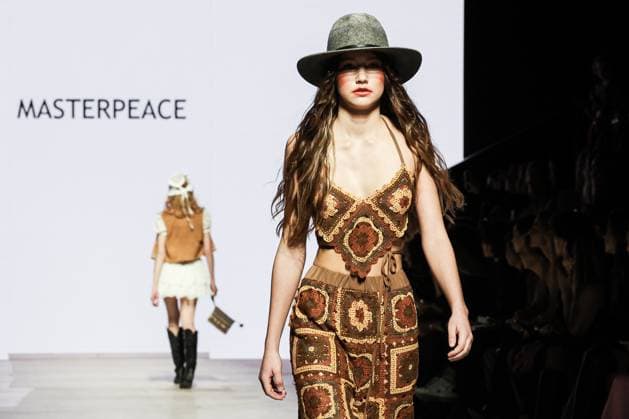 RUSSIA, MOSCOW - MARCH 18, 2025: A model showcases creations during a runway show for the collection by Masterpeace as part of the 4th Moscow Fashion Week at the Manege Central Exhibition Hall. Valery Sharifulin TASS  79203010