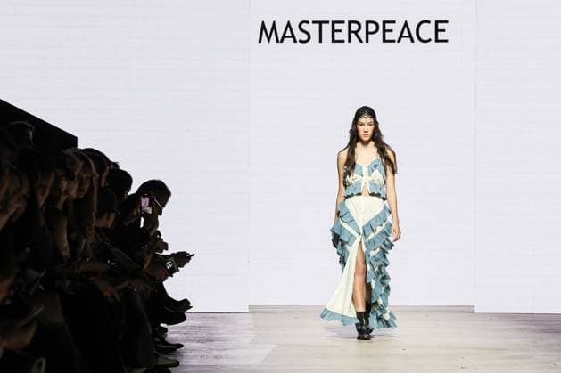 RUSSIA, MOSCOW - MARCH 18, 2025: A model showcases creations during a runway show for the collection by Masterpeace as part of the 4th Moscow Fashion Week at the Manege Central Exhibition Hall. Valery Sharifulin TASS  79203014