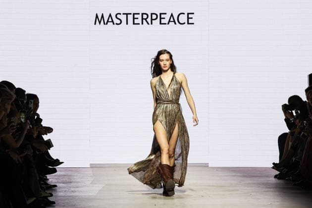 RUSSIA, MOSCOW - MARCH 18, 2025: A model showcases creations during a runway show for the collection by Masterpeace as part of the 4th Moscow Fashion Week at the Manege Central Exhibition Hall. Valery Sharifulin TASS  79203019