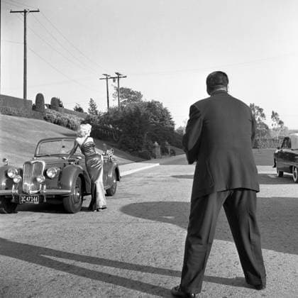 RECORD DATE NOT STATED Marilyn Monroe 1953 in Los Angeles, California: American Actress model and singer MARILYN MONROE leans on a sports car wearing her dress from the movie How to Marry a Millionaire. Famous for playing comedic blonde bombshell charactersshe became one of the most popular sex symbols of the 1950s and early 1960s and was emblematic of the era s sexual revolution. Copyright: x1953,entertainment,film,Hollywood,MarilynxMonroe,movies,vintage,classic,classicxHollywood,1950 s,vintagexHollywood,GoldenxAgexofxHollywood,x