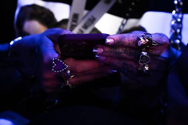 Russia Moscow Fashion Week 8882257 18.03.2025 A visitor waits before a catwalk show by the brand Masterpeace during the 4th Moscow Fashion Week at the Manege Central Exhibition Hall in Moscow, Russia. Vladimir Astapkovich Sputnik Moscow Russia  Copyright: xVladimirxAstapkovichx