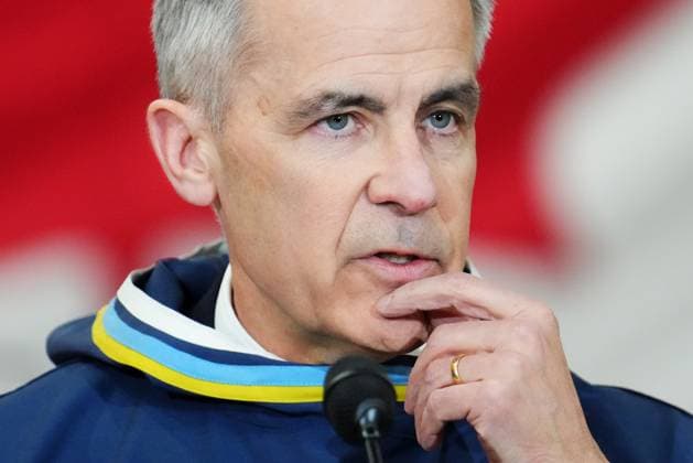 March 18, 2025, Iqaluit, Nunavut, Canada: Prime Minister Mark Carney answers questions from the media after making an announcement at a Canadian Armed Forces forward-operating location in Iqaluit, Nunavut, on Tuesday, March 18, 2025. Iqaluit Canada  - ZUMAc35_ 20250318_zaf_c35_064 Copyright: xSeanxKilpatrickx