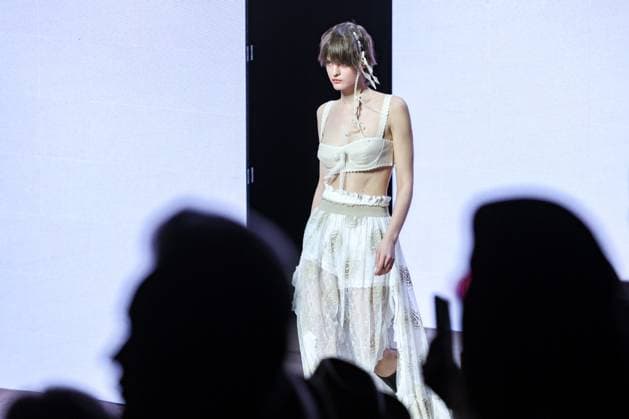 RUSSIA, MOSCOW - MARCH 18, 2025: A model showcases a creation by the brand Masterpeace during a runway show of the 4th Moscow Fashion Week at the Manege Central Exhibition Hall. Arina Antonova TASS  79211538