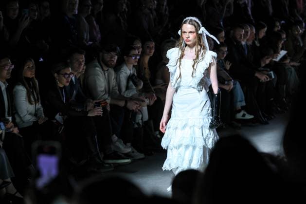 RUSSIA, MOSCOW - MARCH 18, 2025: A model showcases a creation by the brand Masterpeace during a runway show of the 4th Moscow Fashion Week at the Manege Central Exhibition Hall. Arina Antonova TASS  79211542