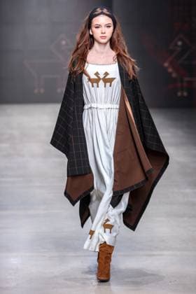 RUSSIA, MOSCOW - MARCH 18, 2025: A model showcases a creation by Bouzma ethnique during a runway show of the 4th Moscow Fashion Week at the Manege Central Exhibition Hall. Arina Antonova TASS  79211527