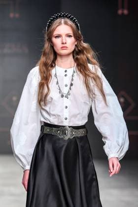 RUSSIA, MOSCOW - MARCH 18, 2025: A model showcases a creation by Bouzma ethnique during a runway show of the 4th Moscow Fashion Week at the Manege Central Exhibition Hall. Arina Antonova TASS  79211529