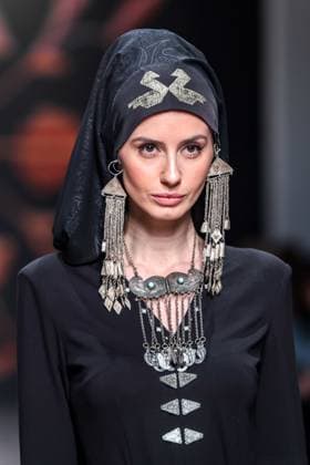 RUSSIA, MOSCOW - MARCH 18, 2025: A model showcases a creation by Bouzma ethnique during a runway show of the 4th Moscow Fashion Week at the Manege Central Exhibition Hall. Arina Antonova TASS  79211532